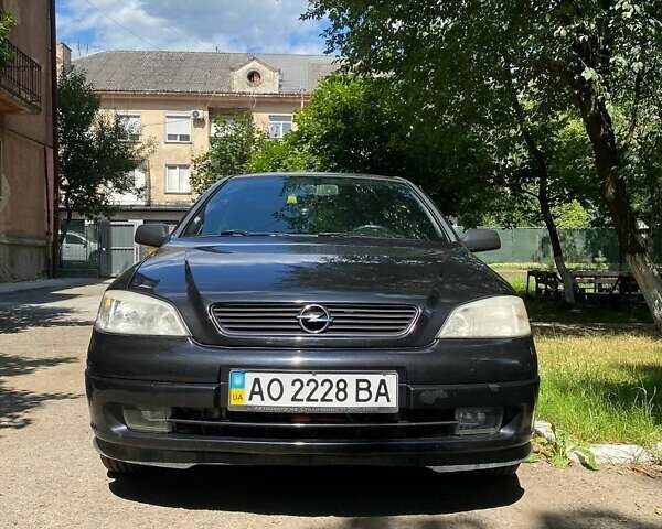 Черный Опель Астра, объемом двигателя 1.67 л и пробегом 169 тыс. км за 3800 $, фото 1 на Automoto.ua