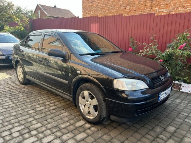 Черный Опель Астра, объемом двигателя 1.6 л и пробегом 151 тыс. км за 3700 $, фото 1 на Automoto.ua