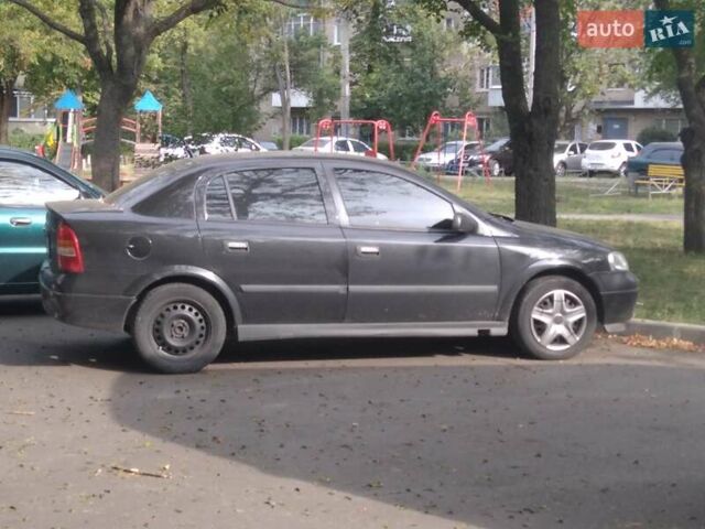 Черный Опель Астра, объемом двигателя 1.6 л и пробегом 184 тыс. км за 3800 $, фото 1 на Automoto.ua