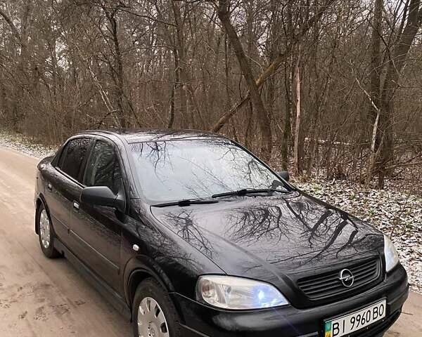 Черный Опель Астра, объемом двигателя 1.4 л и пробегом 160 тыс. км за 3500 $, фото 1 на Automoto.ua