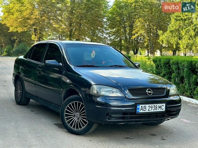 Черный Опель Астра, объемом двигателя 1.4 л и пробегом 359 тыс. км за 3400 $, фото 1 на Automoto.ua