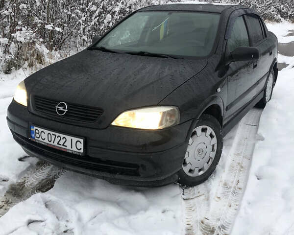 Черный Опель Астра, объемом двигателя 1.39 л и пробегом 161 тыс. км за 3000 $, фото 1 на Automoto.ua