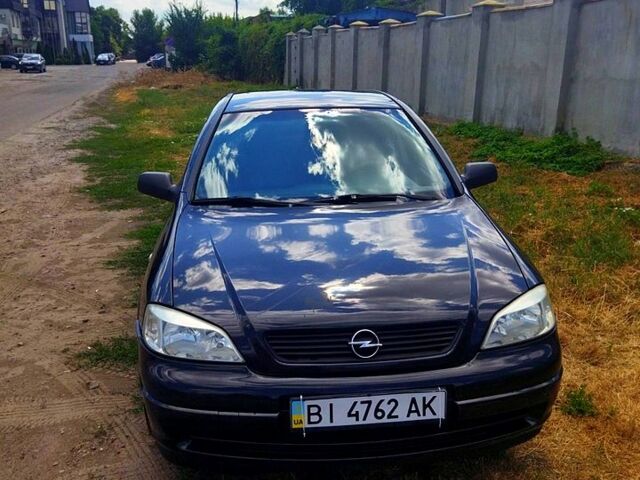 Черный Опель Астра, объемом двигателя 1.4 л и пробегом 141 тыс. км за 4000 $, фото 1 на Automoto.ua
