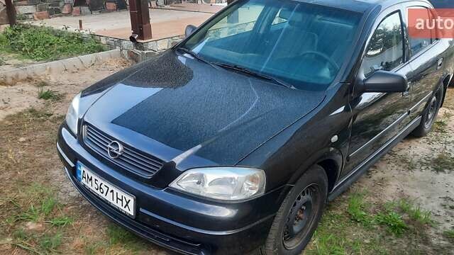 Черный Опель Астра, объемом двигателя 1.36 л и пробегом 158 тыс. км за 4000 $, фото 1 на Automoto.ua