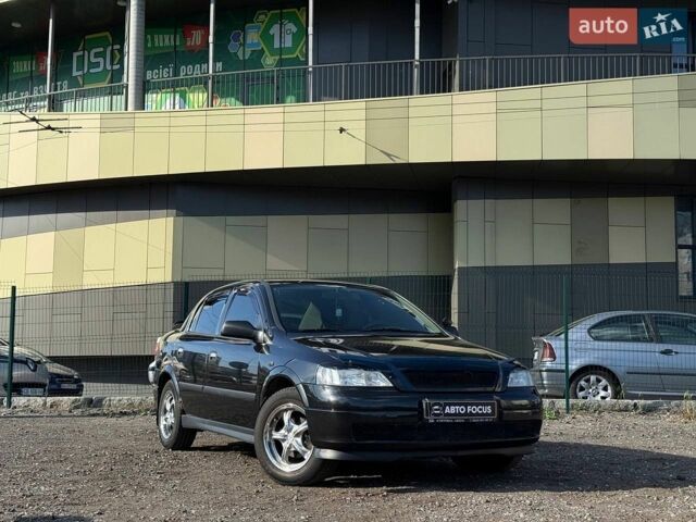 Черный Опель Астра, объемом двигателя 1.39 л и пробегом 260 тыс. км за 3790 $, фото 1 на Automoto.ua