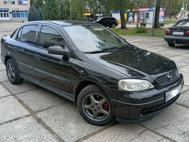 Черный Опель Астра, объемом двигателя 1.4 л и пробегом 178 тыс. км за 3816 $, фото 1 на Automoto.ua