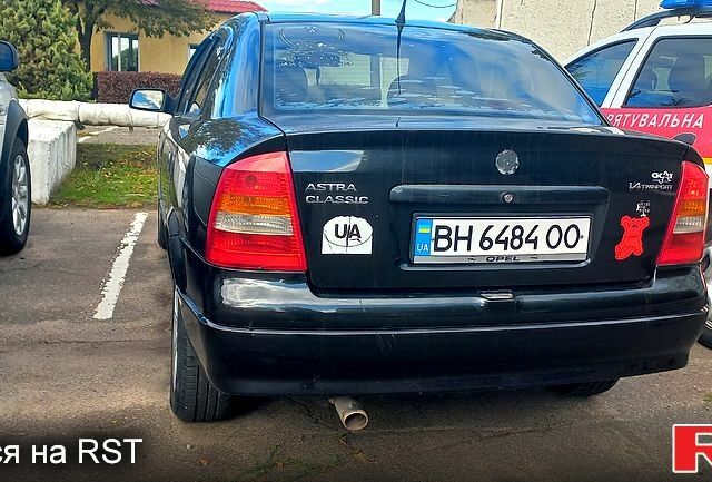 Чорний Опель Астра, об'ємом двигуна 1.4 л та пробігом 320 тис. км за 2000 $, фото 1 на Automoto.ua