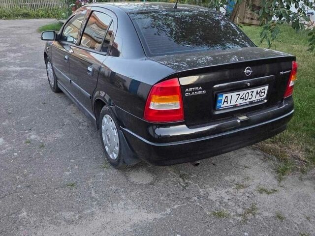 Чорний Опель Астра, об'ємом двигуна 1.6 л та пробігом 227 тис. км за 4250 $, фото 1 на Automoto.ua