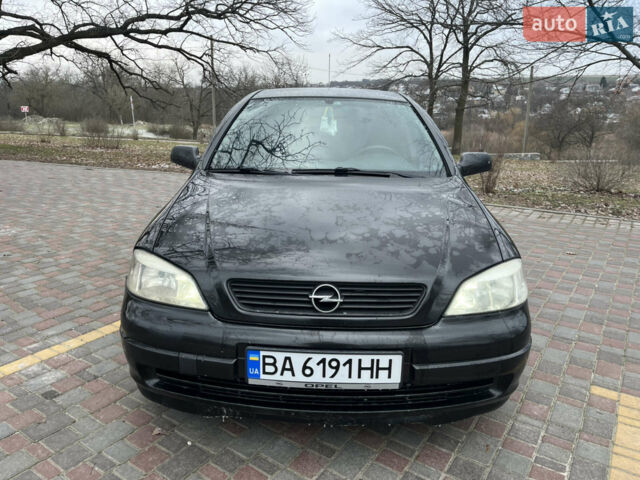 Черный Опель Астра, объемом двигателя 1.6 л и пробегом 247 тыс. км за 4050 $, фото 1 на Automoto.ua