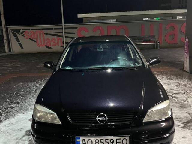 Черный Опель Астра, объемом двигателя 1.4 л и пробегом 338 тыс. км за 2300 $, фото 1 на Automoto.ua