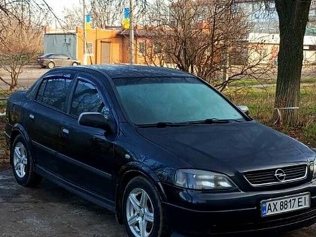 Черный Опель Астра, объемом двигателя 1.6 л и пробегом 210 тыс. км за 3100 $, фото 1 на Automoto.ua
