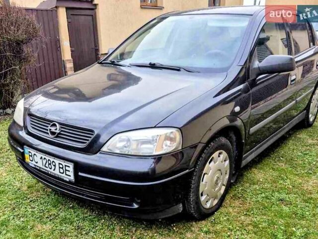 Черный Опель Астра, объемом двигателя 1.4 л и пробегом 160 тыс. км за 4300 $, фото 1 на Automoto.ua
