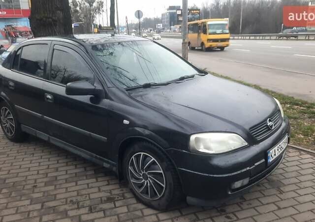 Черный Опель Астра, объемом двигателя 1.6 л и пробегом 277 тыс. км за 3400 $, фото 1 на Automoto.ua