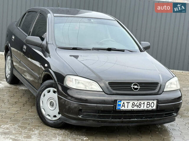 Черный Опель Астра, объемом двигателя 1.6 л и пробегом 199 тыс. км за 3450 $, фото 1 на Automoto.ua