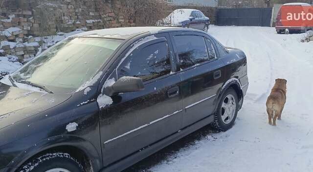 Черный Опель Астра, объемом двигателя 1.4 л и пробегом 160 тыс. км за 4200 $, фото 1 на Automoto.ua