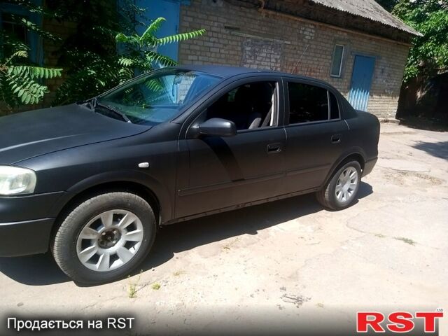 Черный Опель Астра, объемом двигателя 1.4 л и пробегом 100 тыс. км за 3300 $, фото 1 на Automoto.ua
