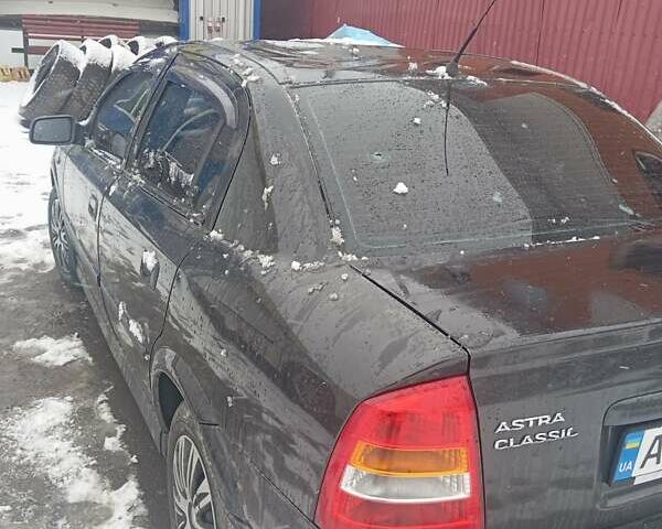 Чорний Опель Астра, об'ємом двигуна 1.39 л та пробігом 150 тис. км за 2300 $, фото 1 на Automoto.ua