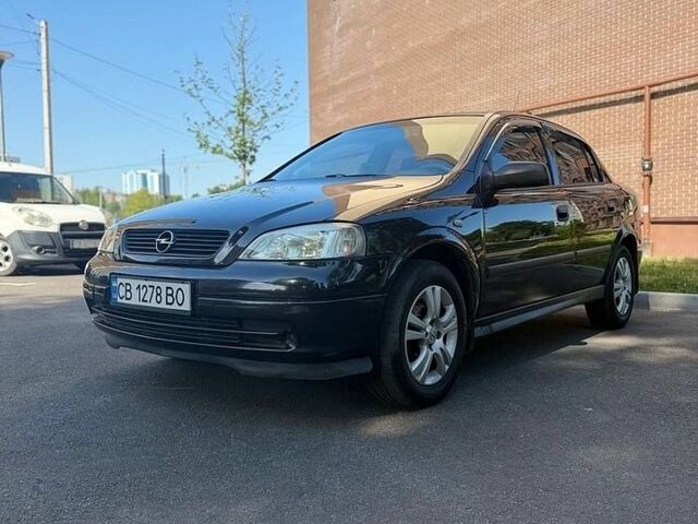 Черный Опель Астра, объемом двигателя 1.6 л и пробегом 309 тыс. км за 3500 $, фото 1 на Automoto.ua