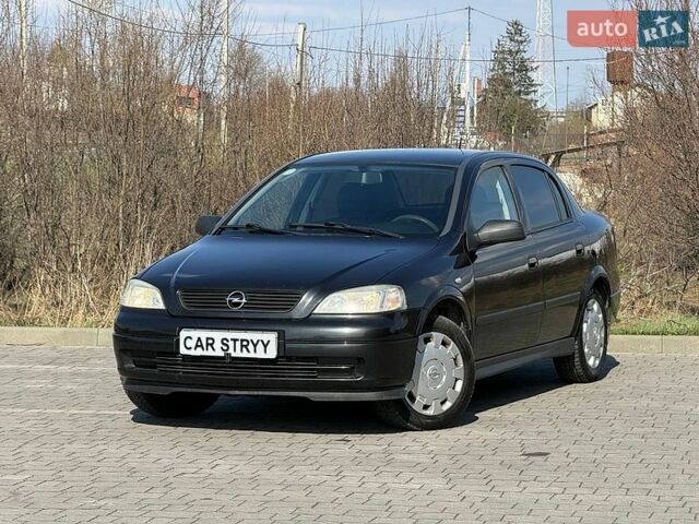 Черный Опель Астра, объемом двигателя 1.4 л и пробегом 159 тыс. км за 3999 $, фото 1 на Automoto.ua