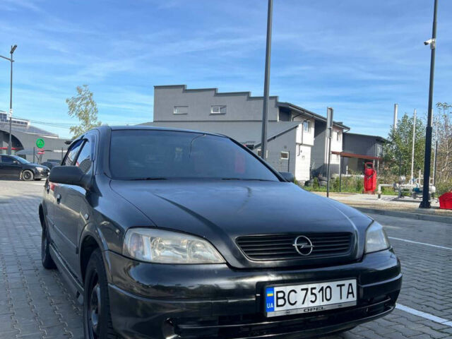 Черный Опель Астра, объемом двигателя 1.4 л и пробегом 290 тыс. км за 2700 $, фото 1 на Automoto.ua