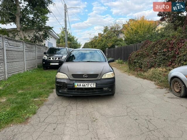 Черный Опель Астра, объемом двигателя 1.4 л и пробегом 240 тыс. км за 1550 $, фото 1 на Automoto.ua