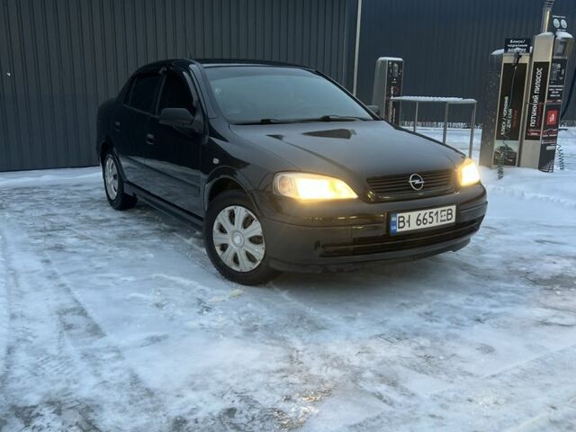 Чорний Опель Астра, об'ємом двигуна 1.6 л та пробігом 159 тис. км за 3900 $, фото 1 на Automoto.ua