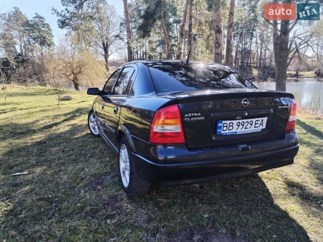 Черный Опель Астра, объемом двигателя 1.6 л и пробегом 270 тыс. км за 3000 $, фото 1 на Automoto.ua