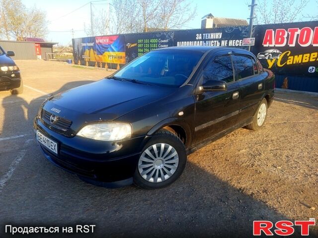 Черный Опель Астра, объемом двигателя 1.4 л и пробегом 300 тыс. км за 3700 $, фото 1 на Automoto.ua