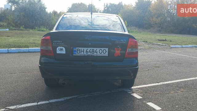 Чорний Опель Астра, об'ємом двигуна 1.36 л та пробігом 290 тис. км за 3900 $, фото 1 на Automoto.ua