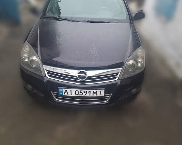 Черный Опель Астра, объемом двигателя 1.6 л и пробегом 180 тыс. км за 3800 $, фото 1 на Automoto.ua