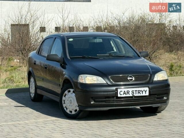 Черный Опель Астра, объемом двигателя 1.4 л и пробегом 159 тыс. км за 4300 $, фото 1 на Automoto.ua