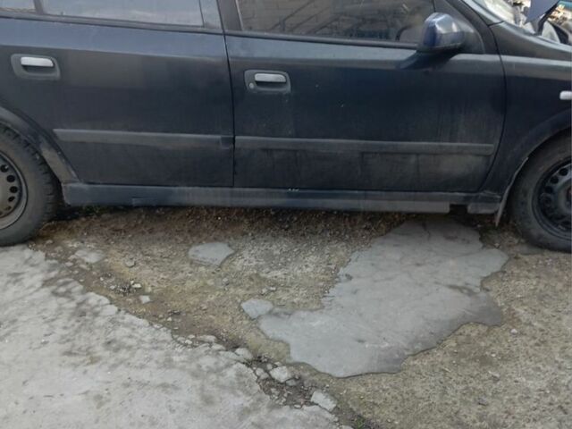 Черный Опель Астра, объемом двигателя 1.4 л и пробегом 171 тыс. км за 809 $, фото 1 на Automoto.ua