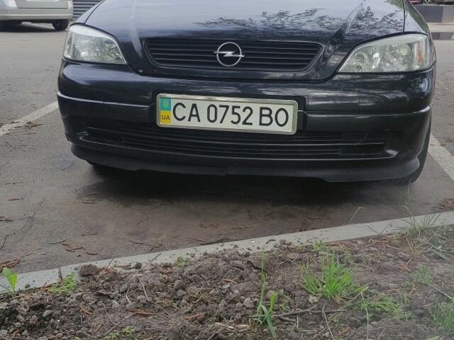 Черный Опель Астра, объемом двигателя 1.4 л и пробегом 227 тыс. км за 3500 $, фото 1 на Automoto.ua