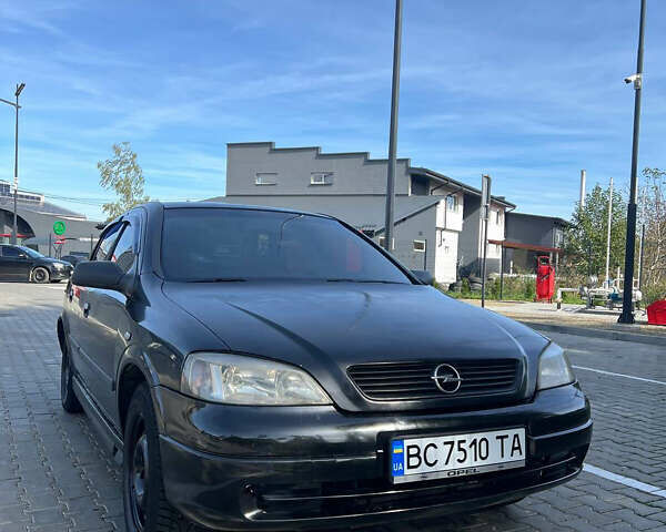 Чорний Опель Астра, об'ємом двигуна 1.4 л та пробігом 290 тис. км за 2700 $, фото 1 на Automoto.ua