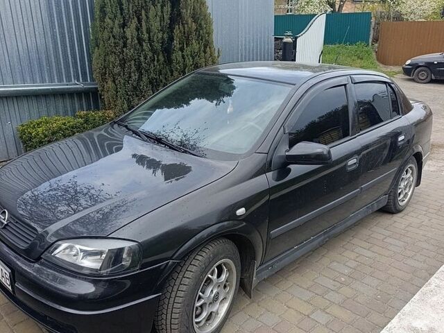 Чорний Опель Астра, об'ємом двигуна 1.6 л та пробігом 287 тис. км за 3600 $, фото 1 на Automoto.ua