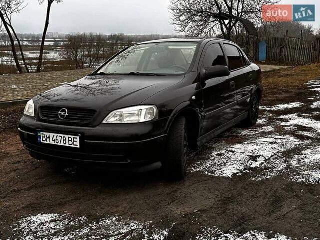 Черный Опель Астра, объемом двигателя 1.36 л и пробегом 207 тыс. км за 3100 $, фото 1 на Automoto.ua