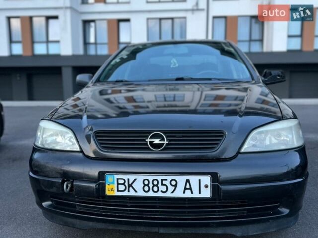 Черный Опель Астра, объемом двигателя 1.6 л и пробегом 245 тыс. км за 3600 $, фото 1 на Automoto.ua