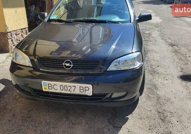 Черный Опель Астра, объемом двигателя 1.6 л и пробегом 122 тыс. км за 5700 $, фото 1 на Automoto.ua