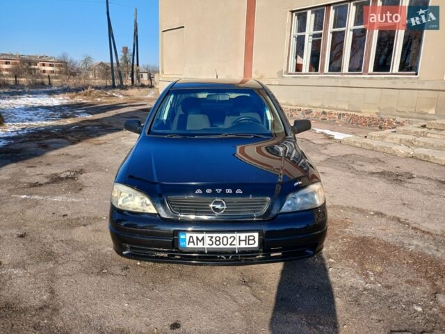 Черный Опель Астра, объемом двигателя 1.4 л и пробегом 212 тыс. км за 3550 $, фото 1 на Automoto.ua