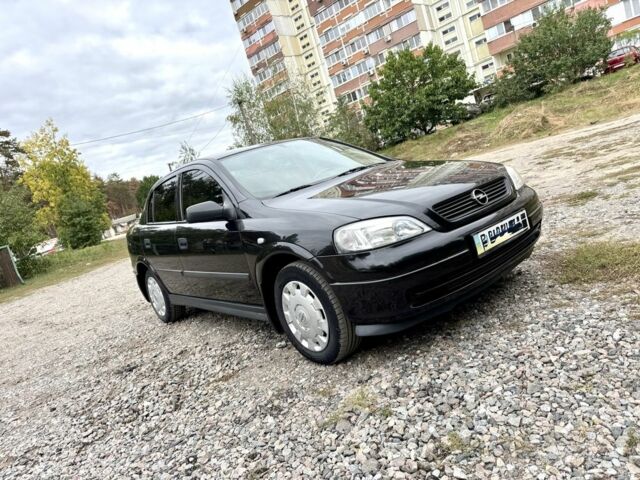Черный Опель Астра, объемом двигателя 1.4 л и пробегом 176 тыс. км за 4390 $, фото 1 на Automoto.ua