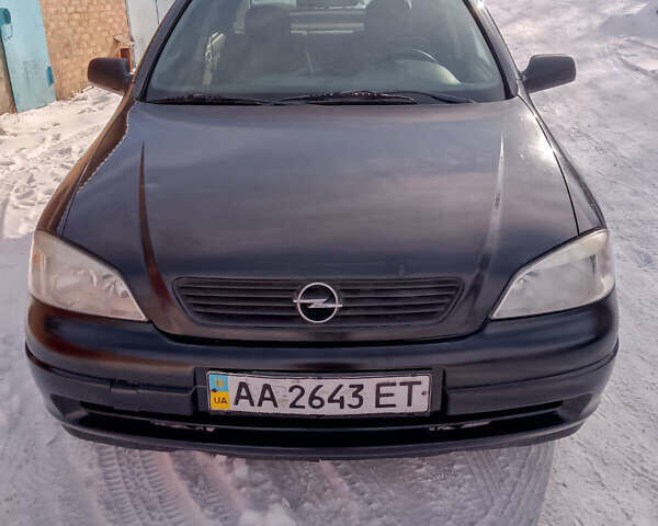 Черный Опель Астра, объемом двигателя 1.4 л и пробегом 170 тыс. км за 2500 $, фото 1 на Automoto.ua