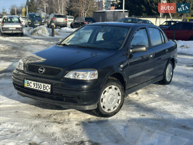 Черный Опель Астра, объемом двигателя 1.4 л и пробегом 289 тыс. км за 3200 $, фото 1 на Automoto.ua