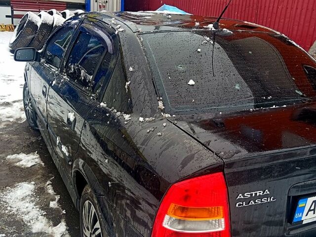 Чорний Опель Астра, об'ємом двигуна 1.4 л та пробігом 150 тис. км за 1900 $, фото 1 на Automoto.ua