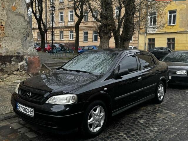 Чорний Опель Астра, об'ємом двигуна 1.6 л та пробігом 250 тис. км за 2000 $, фото 1 на Automoto.ua