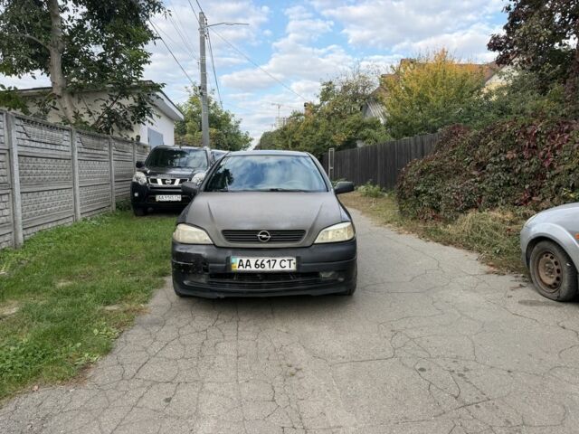 Черный Опель Астра, объемом двигателя 1.4 л и пробегом 240 тыс. км за 1554 $, фото 1 на Automoto.ua