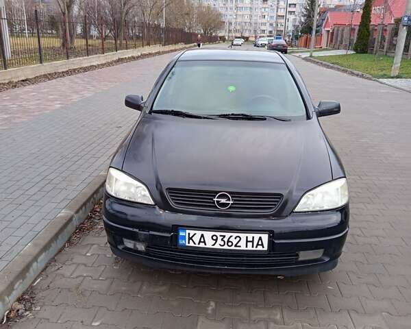 Черный Опель Астра, объемом двигателя 1.6 л и пробегом 285 тыс. км за 3300 $, фото 1 на Automoto.ua