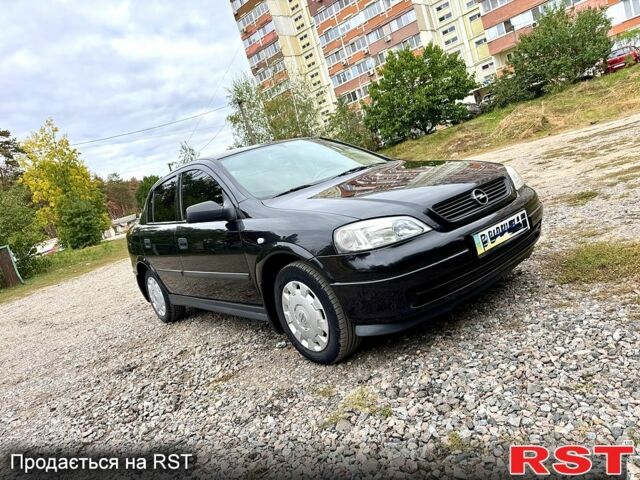 Черный Опель Астра, объемом двигателя 1.4 л и пробегом 176 тыс. км за 4390 $, фото 1 на Automoto.ua