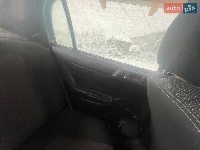 Черный Опель Астра, объемом двигателя 1.4 л и пробегом 307 тыс. км за 3100 $, фото 1 на Automoto.ua