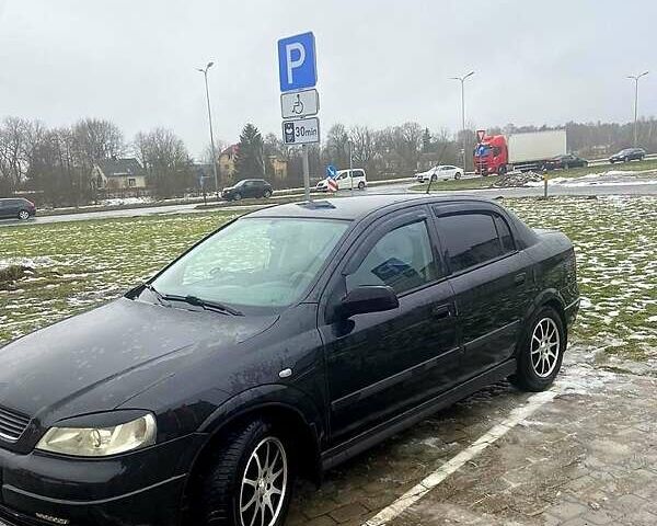 Чорний Опель Астра, об'ємом двигуна 1.4 л та пробігом 203 тис. км за 4500 $, фото 1 на Automoto.ua