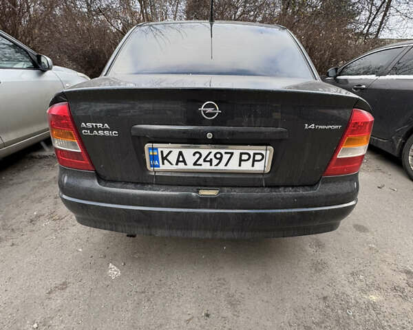 Черный Опель Астра, объемом двигателя 1.4 л и пробегом 225 тыс. км за 2799 $, фото 1 на Automoto.ua